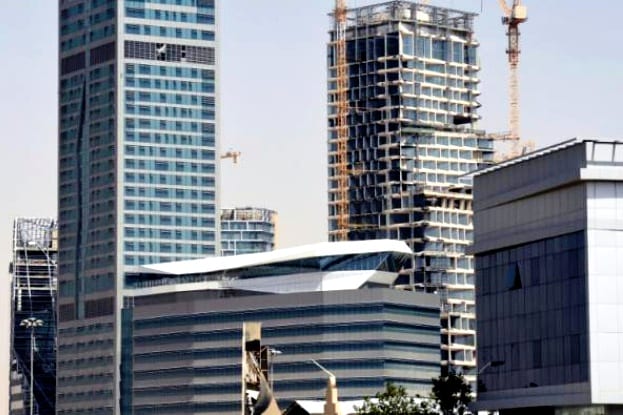 648x415_photo_prise_le_9_mars_2016_de_tours_en_construction_dans_le_quartier_des_affaires_de_ryad_en_arabie_saoudite_le_geant_saoudien_du_btp_saudi_oger_est_l_un_des_constructeurs
