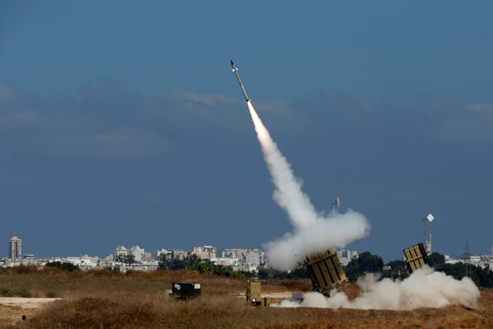 An Iron Dome launcher fires an interceptor rocket in the southern Israeli city of Ashdod