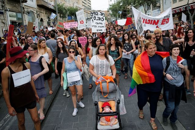 people-take-part-in-a-slutwalk-protest-during-which-several-hundred-participants-march-through-the-centre-of-jerusalem_5597313