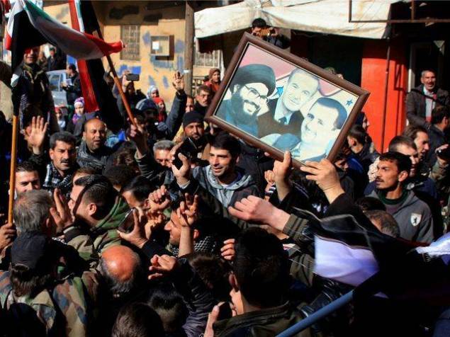 syrians-thank-hezbollah-and-assad-in-the-streets-AFP-640x480_853358_large
