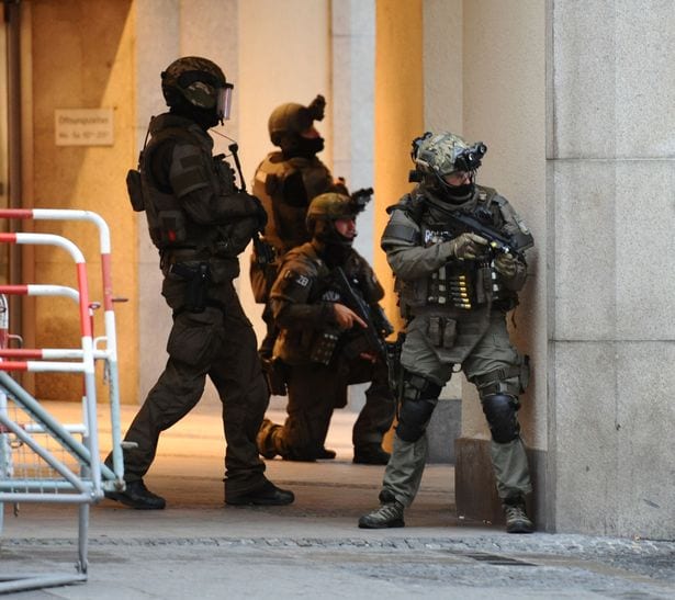 Police-secures-teh-area-of-a-subway-station-Karlsplatz-Stachus-near-a-shopping-mall