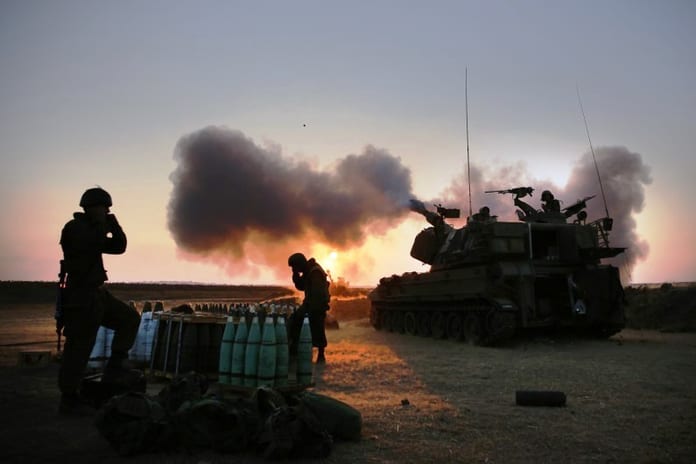 7773337519_des-soldats-israeliens-a-la-frontiere-entre-israel-et-la-bande-de-gaza-le-21-juillet-2014