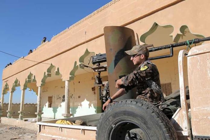 village-syrian-democratic-forces-weapon-fighter-installed_94749c4e-d413-11e6-a11a-def9b3756538_801_534