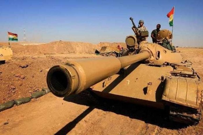 des-combattants-peshmergas-sur-un-char-pres-de-la-ligne-de-front-a-khazer-a-40-km-a-l-ouest-de-erbil-en-irak-le-7-septembre-2014_705_470