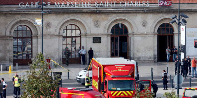 Emergency services vehicles are seen outside the Saint-Charles train station after French soldiers shot and killed a man who stabbed two women to death at the main train station in Marseille
