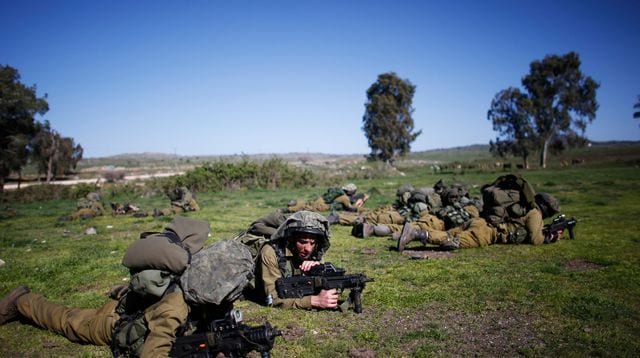 israeli-soldiers-take-position-during-an-exercise-in-the-israeli-occupied-golan-heights-near-the-border-with-syria_4856385