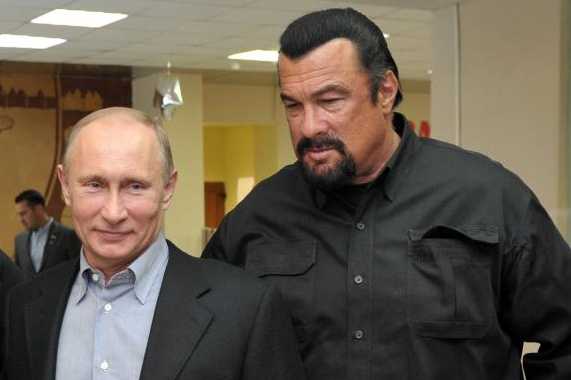 163605519-russias-president-vladimir-putin-and-american-action_571_381