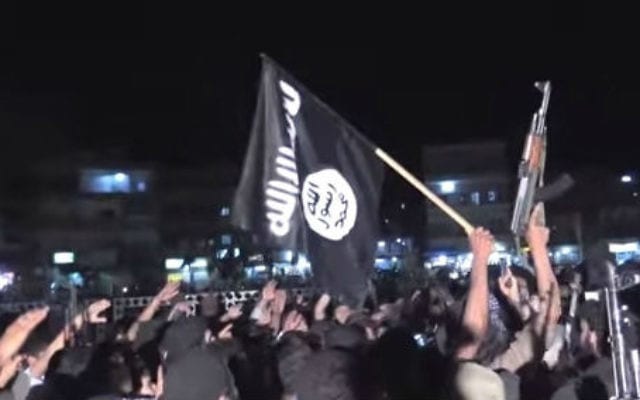 Les-supporters-de-lEtat-islamique-à-une-manifestation-à-Raqqa-en-Syrie-Crédit-Capture-décran-YouTubevice-640x400