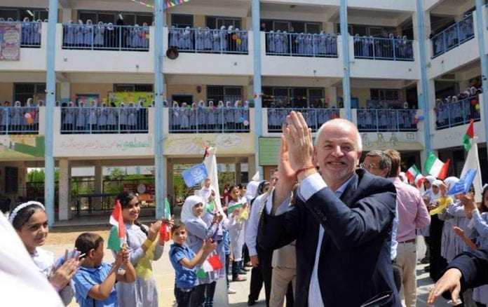 UNRWA-officials-celebrating-in-a-school-run-by-the-agency-696x438