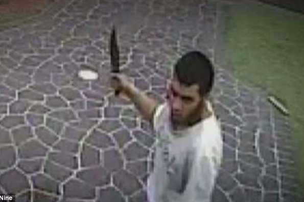 4C09324600000578-0-Ihsas_Khan_was_charged_with_committing_a_terrorist_act_and_wound-a-18_1525906997703_596_397 (1)