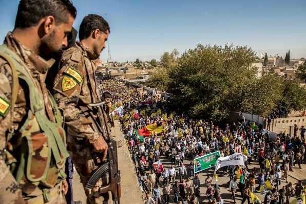 ypg-fighters-kurds-protest-turkeys-invasion-600x400_596_398