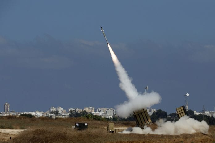 An Iron Dome launcher fires an interceptor rocket in the southern Israeli city of Ashdod