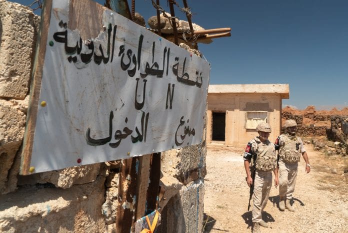 membres-police-militaire-russe-occupent-poste-abandonne-Casques-bleus-Nations-unies-Golan-syrien-14-2018_1_1399_935