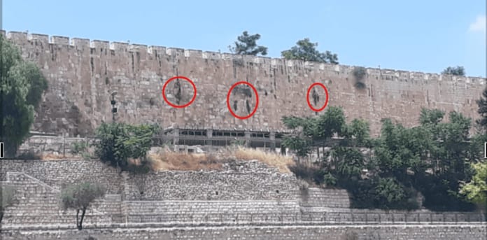 god-on-wall-696x343