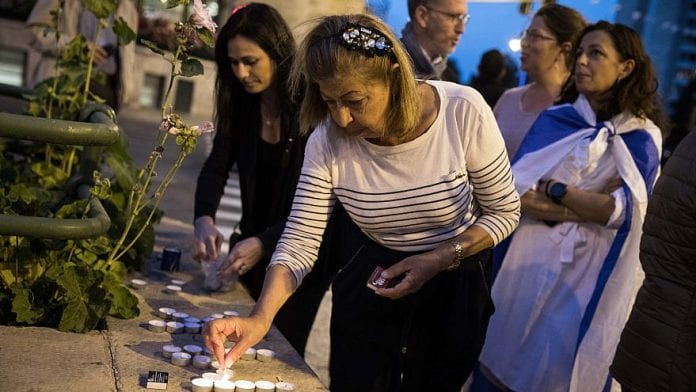 Candles-for-French-Woman-Mireille-Knoll-in-Israel-880x495