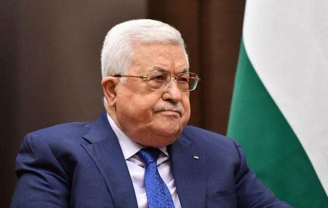 FILE PHOTO: Russian President Vladimir Putin meets with Palestinian President Mahmoud Abbas in Sochi