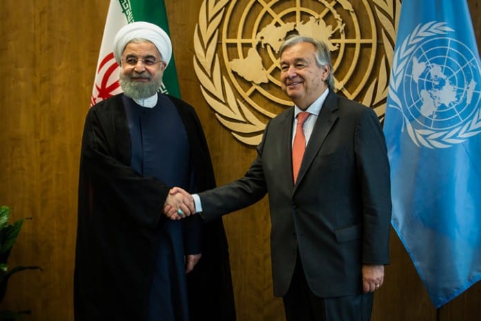 Antonio-Guterres-shakes-hands-with-Iran’s-former-president-Hassan-Rouhani-September-18-2017.-696x464