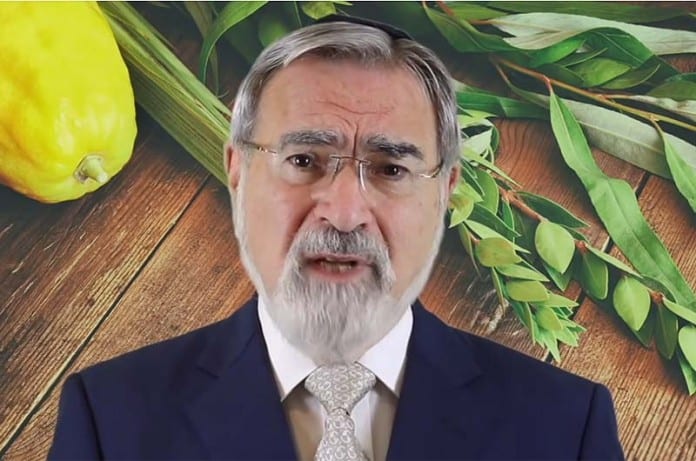 The-Late-Rabbi-Jonathan-Sacks-speaking-about-Sukkot-696x461