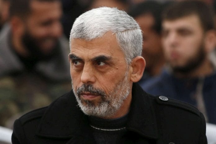 FILE PHOTO: Hamas leader Yehya Al-Sinwar attends a rally in Khan Younis in the southern Gaza Strip