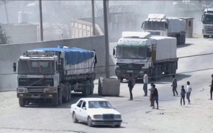 Aid convoy enters Gaza through the Rafah crossing