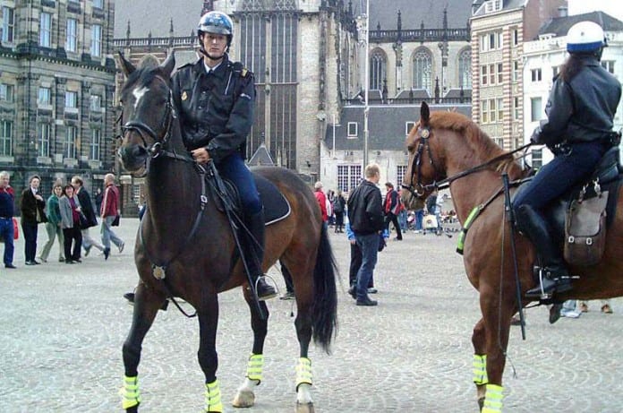 Mounted-police-in-Amsterdam-696x461