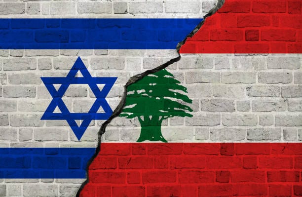 Israel and Lebanon flags together. Israel and Lebanon conflict.