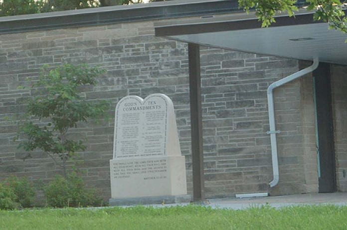 The-10-commandments-on-display-in-the-front-of-a-school-June-3-2007.-696x461