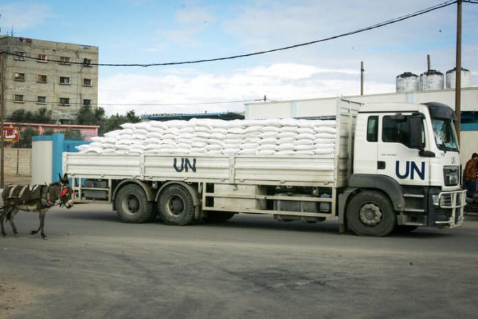 UN-truck-carrying-humanitarian-aid-in-Rafah-the-southern-Gaza-Strip.-696x464