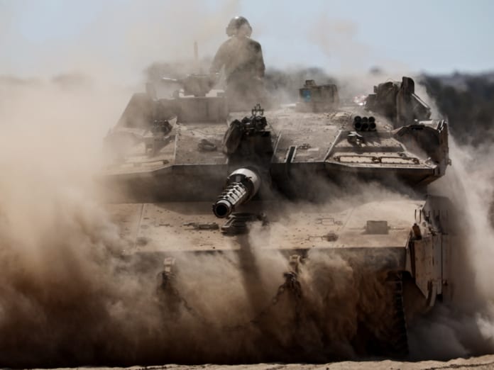 Istaeli tanks patrol Gaza border