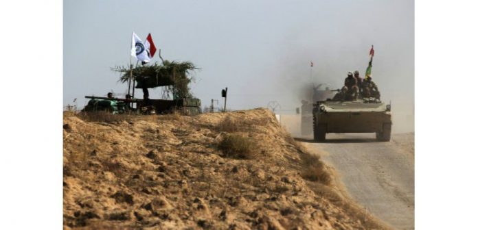 16284750-l-irak-a-l-assaut-du-dernier-bastion-de-l-ei-sur-son-sol