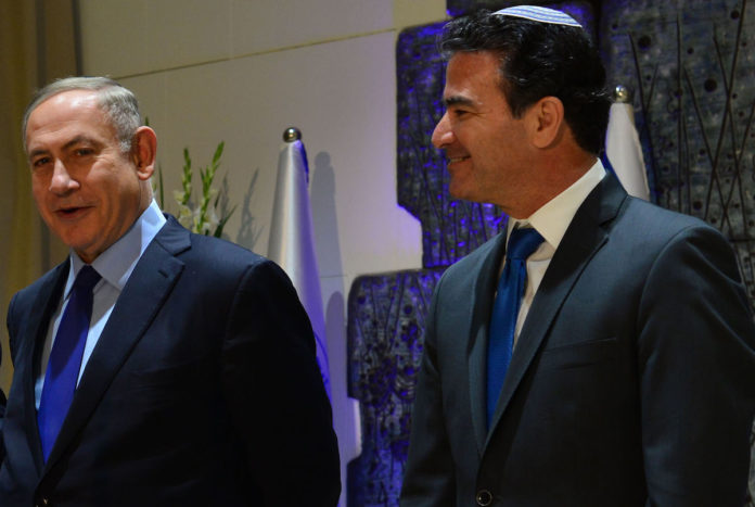 Reuven_Rivlin_Benyamin_Netanyahu_and_Yossi_Cohen_presented_certificates_of_merit_to_twelve_outstanding_employees_of_the_institution_in_2016_GPO103
