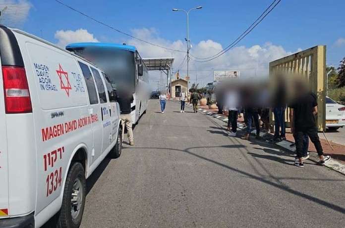 An-MDA-ambulance-parked-behind-the-bus-that-was-attacked-outside-the-Karnei-Shomron-gate-April-7-2024.-696x461