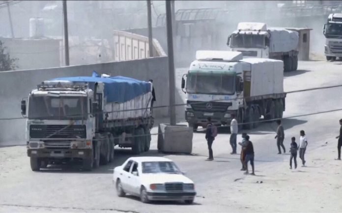 Aid convoy enters Gaza through the Rafah crossing