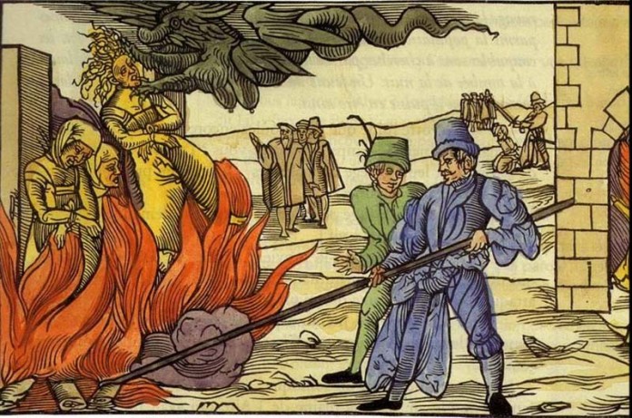 Inquisitors-setting-people-on-fire.-696x461