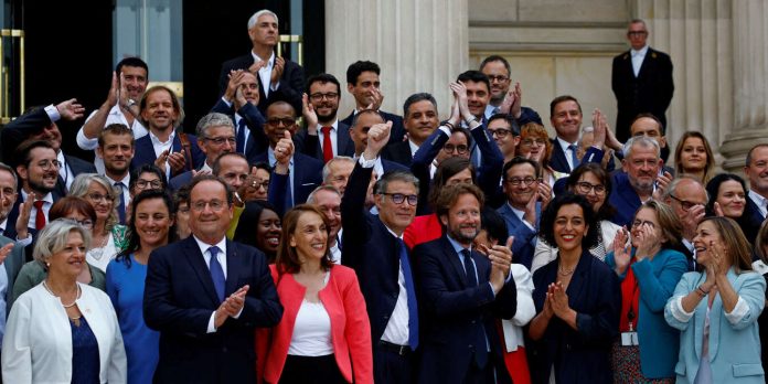 FILE PHOTO: Newly-elected lawmakers make entry to the National Assembly in Paris